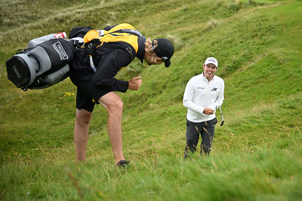 Matt Fitzpatrick celebrates his chip-in at the 16th